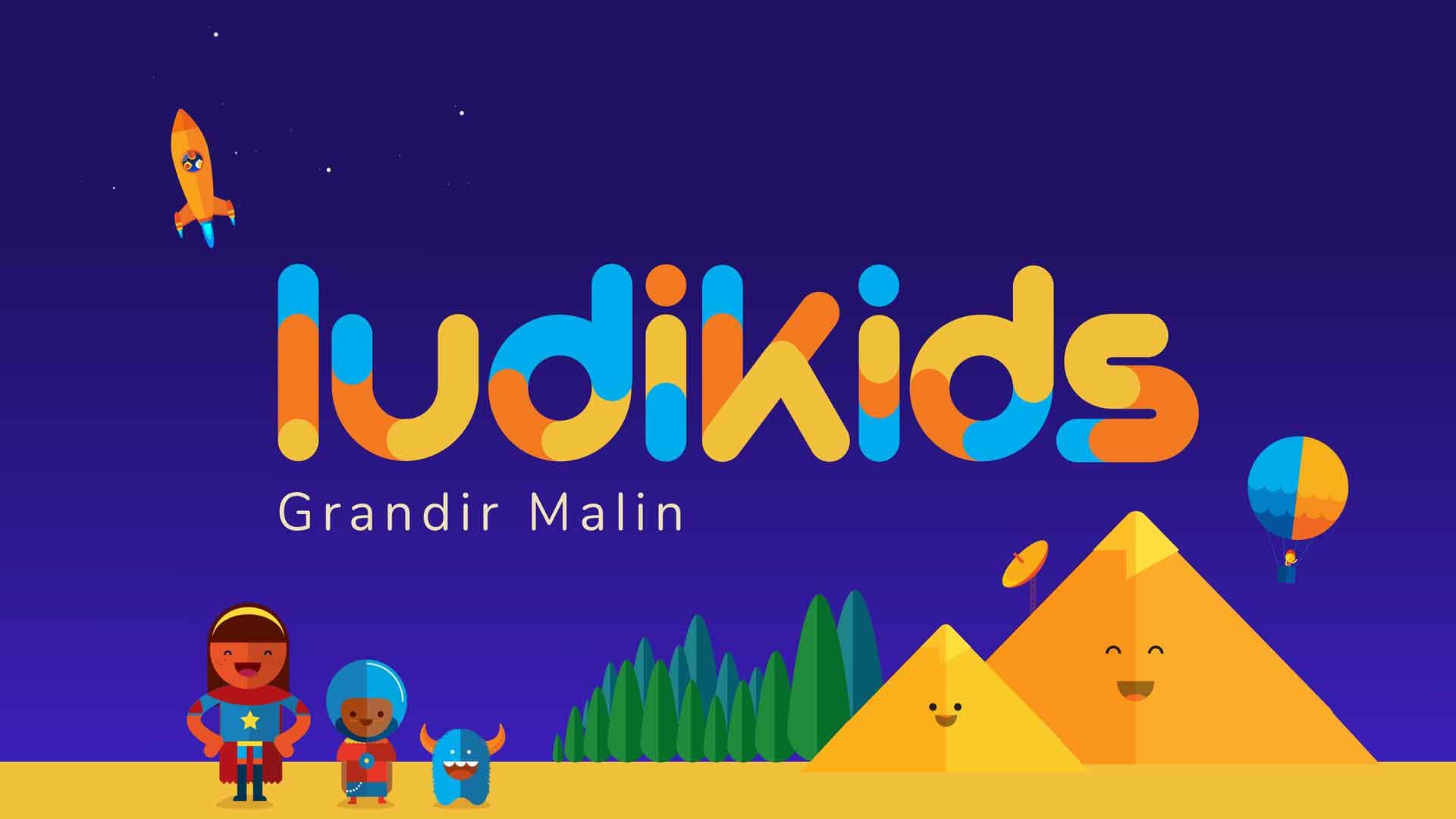 Ludikids logo. cute pyramids in the background